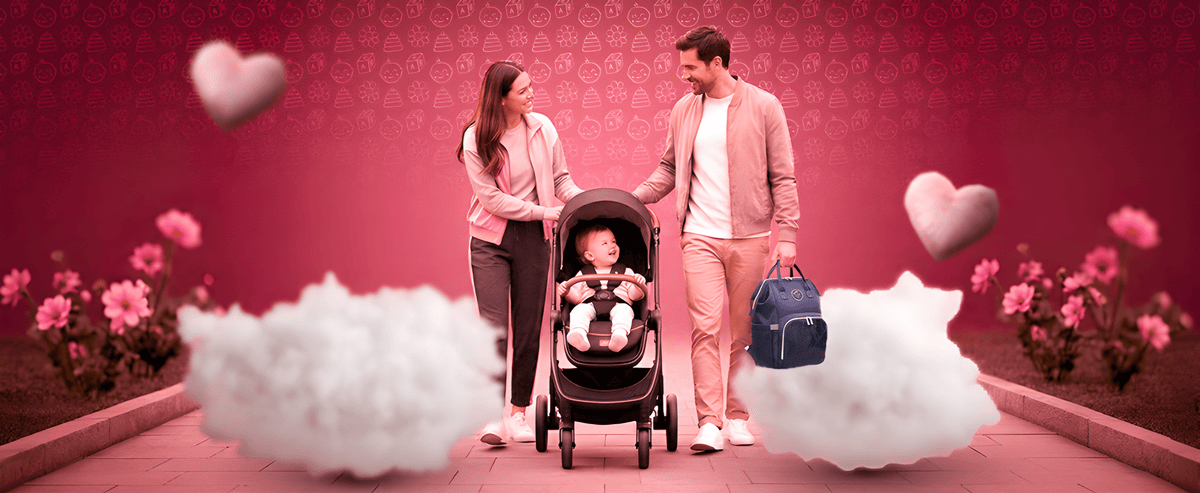 Family with a baby in a stroller on a pink background with hearts and flowers